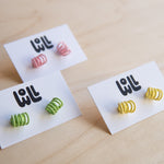 WOLL: Coil Stud Earrings