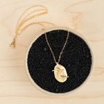 8.6.4: Visage Pendant Necklace