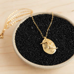 8.6.4: Visage Pendant Necklace