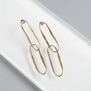 Kari Phillips: Giacometti Double Loop Earrings