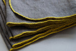Celina Mancurti: Grey Linen Napkins with Yellow Stitching (18 x 18)