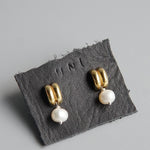 Uni: White Pearl Loua Studs