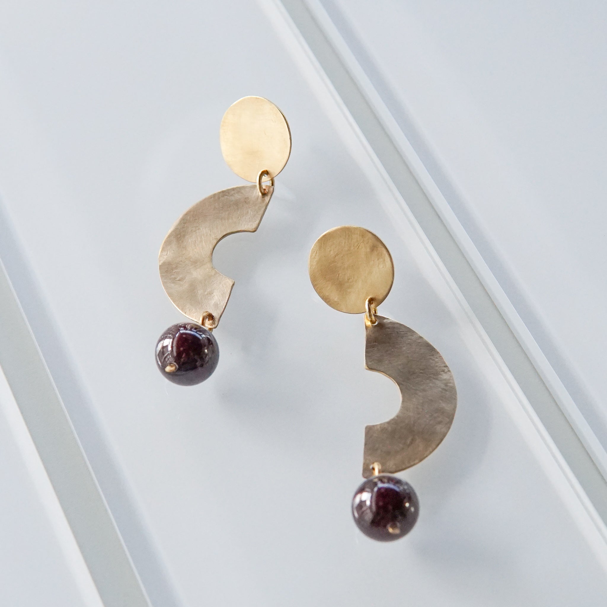 Kari Phillips: Geometric Drop Earrings with Garnet